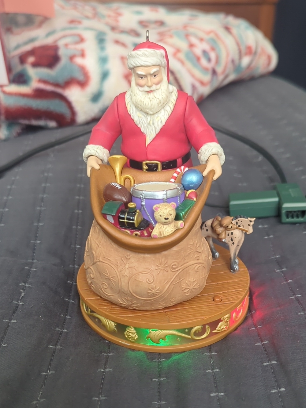 Hallmark Santa Ornament Figurine in Red and Tan with Colorful Toys